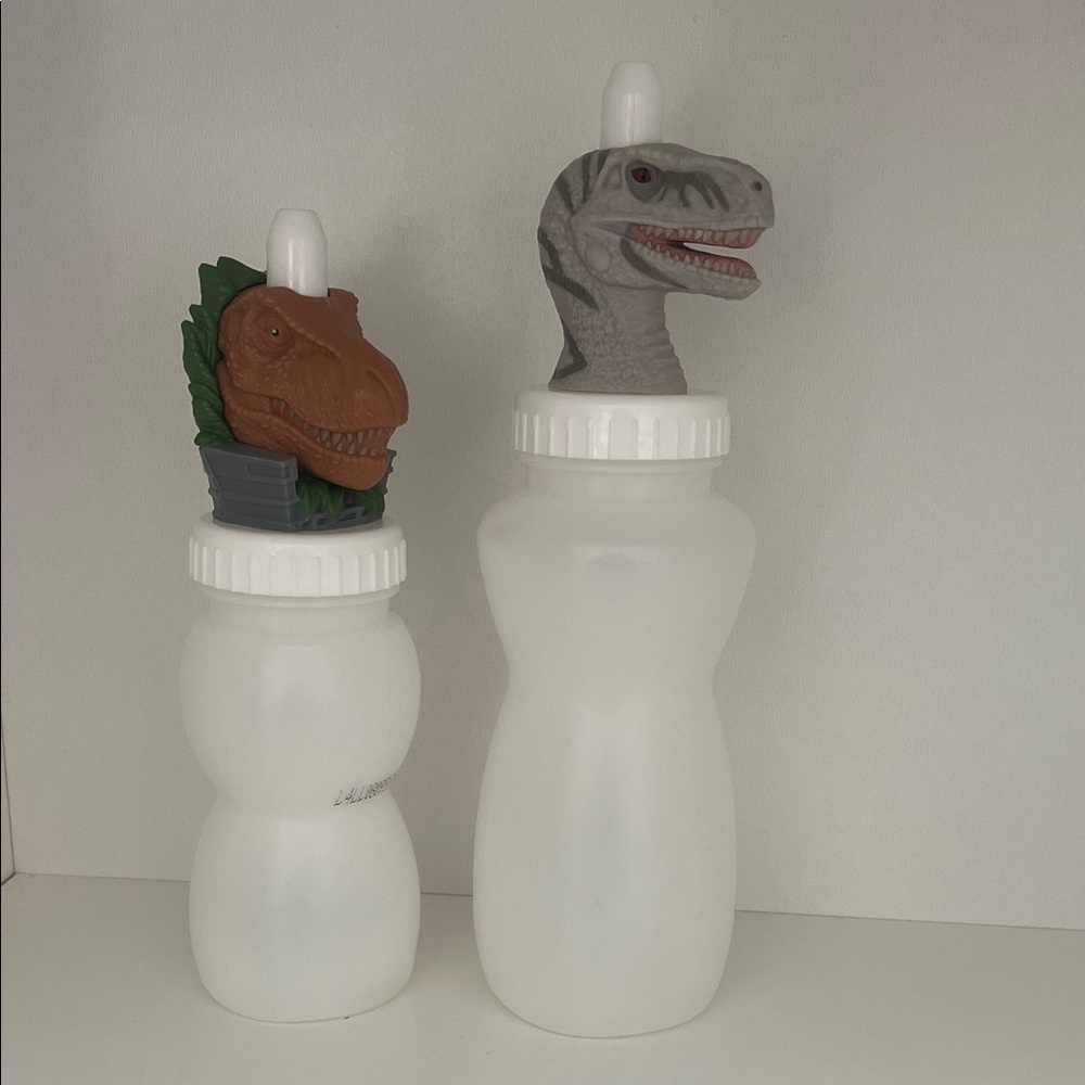 Good2Grow dinosaur toppers with large and small bottle